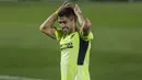 Ekspresi striker Atletico Madrid, Luis Suarez, saat melawan Getafe pada laga Liga Champions di Stadion Alfonso Perez, Sabtu (13/3/2021). Kedua tim bermain imbang 0-0. (AP/Manu Fernandez)