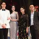 Nagita Slavina tampil mengenakan long dress hitam dengan bordiran bunga, didampingi suaminya Raffi Ahmad yang mengenakan setelan jas hitam. [@raffinagita1717]