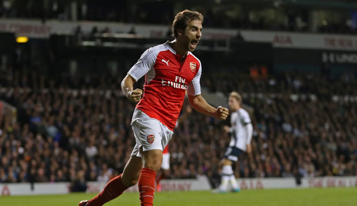 Ekspresi Mathieu Flamini, setelah mencetak gol pertama ke gawang Tottenham Hotspur dalam laga putaran ketiga Piala Liga Inggris di Stadion White Hart Lane, Inggris, Kamis (24/9/2015) dini hari WIB. (Action Images via Reuters/Matthew Childs)