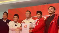 Pasangan bakal cagub-cawagub Jakarta Ridwan Kamil-Suswono menerima dokumen B1 KWK dari PSI. RK-Suswono pun siap mendaftar ke KPU pada 28 Agustus 2024 mendatang. (Liputan6.com/Winda Nelfira)