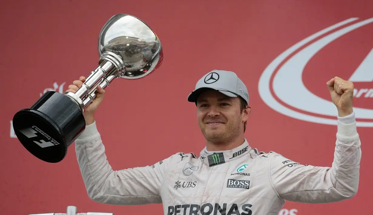 Pebalap Mercedes, Nico Rosberg, tampil dominan pada balapan F1 GP Jepang di Sirkuit Suzuka, Minggu (9/10/2016). (AFP/Yuya Shino)