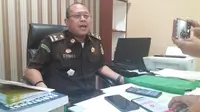 Kejati Sulsel resmi tetapkan mantan Direktur Operasional PD. Parkir Makassar Raya jadi tersangka korupsi (Liputan6.com/ Eka Hakim)