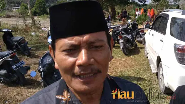 Kepala Desa Pandau Jaya, Siak Hulu, Kabupaten Kampar, Firdaus.