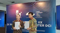 President Director PT DCI Indonesia Marco Cioffi dan Ketua Umum APJII Muhamad Arif (ki-ka. Doc: Liputan6com/Sulunglahitani)
