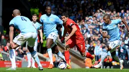 Luis Suarez yang bermain di Liverpool pada kurun waktu 2011-2014 berada di peringkat 9. (AFP Photo/Andrew Yates)