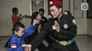 Berbekal dari belajar silat Chingkrik di wilayah Bukit Duri yang digurui oleh Kong Sulaiman, Iwan diamanatkan untuk mengembangkan seni beladiri Betawi tersebut kepada anak-anak muda di lingkungan tempat tinggalnya, yakni di Kampung Pulo. (merdeka.com/Iqbal S Nugroho)