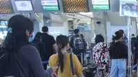 Ilustrasi check-in di bandara (Liputan6.com)
