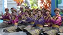Tari saman asal Aceh turut meramaikan acara puncak Peringatan Hari Anak Nasional di Istana Bogor, Jawa Barat, Selasa (11/8/2015). Acara ini dihadiri oleh ratusan anak-anak dari berbagai daerah di Indonesia. (Liputan6.com/Faizal Fanani)