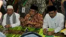 Rois Am PBNU terpilih, KH Ma'ruf Amin (kiri), Ketua PBNU terpilih, KH. Said Aqil Siradj (tengah) dan Ketua Panitia Daerah Muktamar NU ke-33 Saifullah Yusuf saat penutupan Muktamar NU di Jombang, Jawa Timur, Kamis (6/8/2015). (Liputan6.com/Johan Tallo)