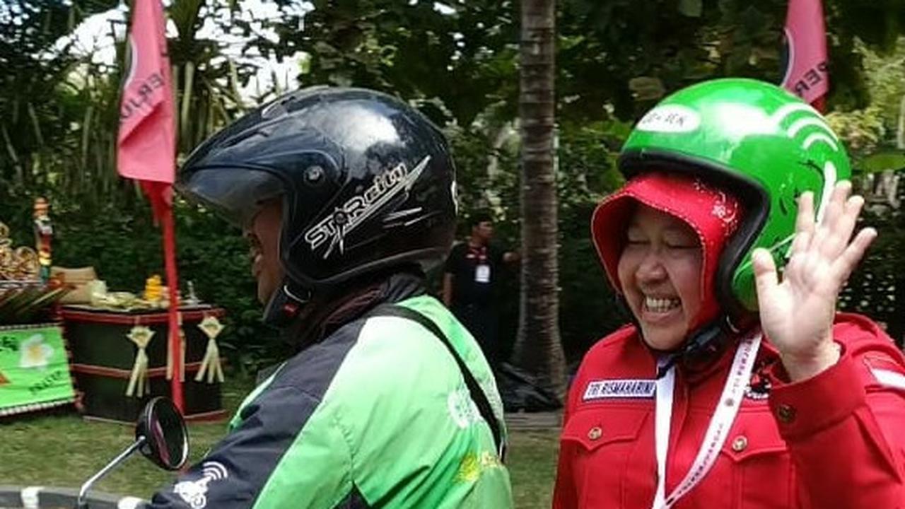 Wali Kota Risma Naik Ojek Online Menuju Lokasi Kongres PDIP