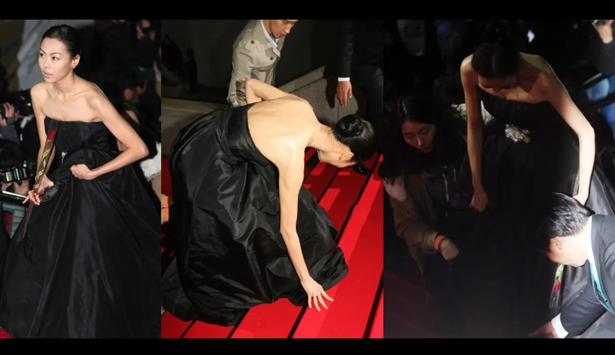 Aktris Kim Min Hee terpeleset karena gaunnya sendiri saat di red carpet  “30th Blue Dragon Awards” tahun 2009 (Istimewa)