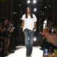 Desainer&nbsp;Prancis Olivier Rousteing menyapa penonton di akhir peragaan busana Balmain untuk koleksi Women Ready-to-wear Spring-Summer 2026 sebagai bagian dari Paris Fashion Week, di Paris, Prancis, pada 1 Oktober 2025. (JULIEN DE ROSA/AFP)