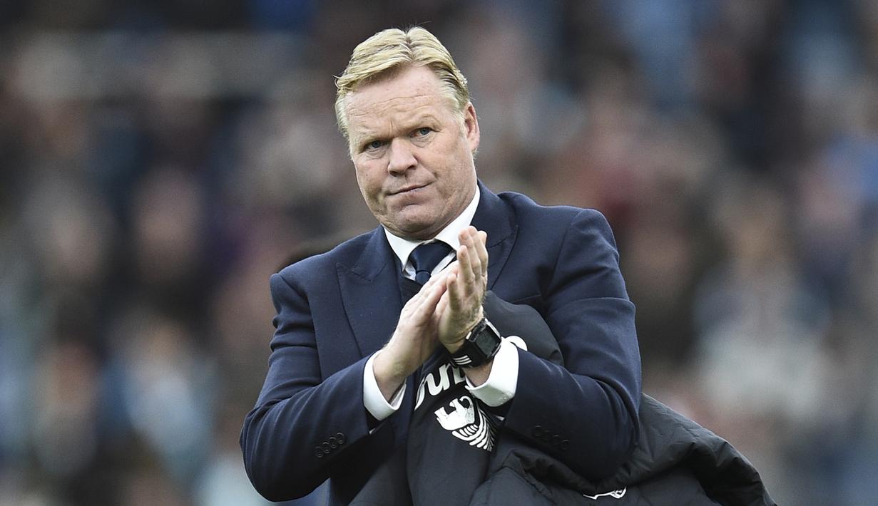 Koeman memiliki catatan delapan trofi dalam 20 tahun kariernya sebagai pelatih. Salah satunya saat membawa Valencia meraih trofi Spanish Cup pada musim 2007/2008. (AFP/Oli Scarff)