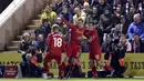Kegembiraan Lucas Leiva (tangah) saat merayakan golnya ke gawang Plymouth Argyle pada babak ketiga Piala FA di Home Park, Plymouth, (18/1/2017).  Liverpool menang 1-0. (Andrew Matthews/PA via AP)
