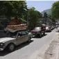 Warga melarikan diri dari kekerasan geng di ibu kota Haiti (Richard Pierrin/ AFP)