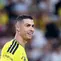 Penyerang Al Nassr asal Portugal, Cristiano Ronaldo, bereaksi saat pertandingan Saudi Pro League antara Al Nassr FC dan Neom FC di Stadion Awwal Park, Riyadh, Arab Saudi, Selasa (20/10/2026). (Fayez Nureldine/AFP)