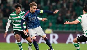 Aksi Martin Odegaard dalam laga Sporting CP vs Arsenal di perempat final Liga Champions 2025/2026, Rabu (8/4/2026). (AP Photo/Armando Franca)
