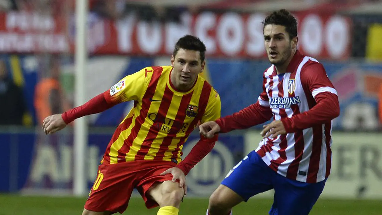 Striker Barcelona Lionel Messi dan gelandang Atletico Madrid Koke