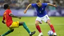 Les Bleus ada di peringkat pertama dan sulit digeser tim lain di grup A sepak bola Olimpiade 2024 setelah sebelumnya juga menang 3-0 atas Amerika Serikat. (AP Photo/Julio Cortez)