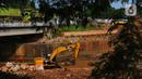 Proyek sodetan Kali Ciliwung-Kanal Banjir Timur terus dikerjakan untuk pelebaran aliran untuk mengantisipasi banjir Ibu Kota. (merdeka.com/imam buhori)