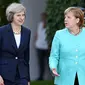 PM Inggris Theresa May dan Kanselir Jerman Angela Merkel (Standard)