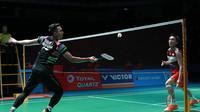 Tunggal putra Indonesia, Jonatan Christie, mengalahkan pemain Jepang, Kento Momota, pada babak kedua Malaysia Terbuka 2019, di Axiata Arena, Kamis (4/4/2019). (PBSI)
