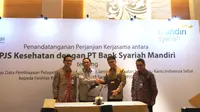 Penandatangan kerjasama BPJS Kesehatan dan Bank Syariah Mandiri untuk program Supply Chain Finansing (SCF). (Liputan6.com/Fitri Haryanti Harsono)