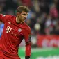 4. Meskipun terus menolak jika dikatakan akan pindah dari Bayern Munchen. Hal itu tidak membuat Manchester City berhenti menggoda striker asal Jerman, Thomas Muller untuk kembali bermain bersama Guardiola. (AFP/Christof Stache)