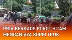 Aksi anarkis ditunjukkan oleh seorang pria terhadap sopir truk di tengah jalan mengundang perhatian.