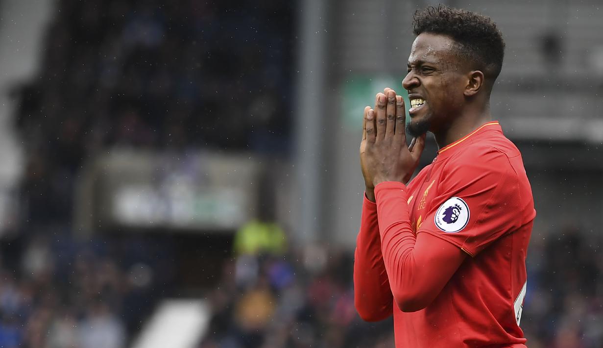 Divock Origi pemain Belgia yang saat ini berkostum Liverpool. Origi telah tampil 22 kali dan mencetak 3 gol untuk timnas Belgia.   (AFP/Justin Tallis)