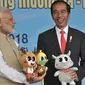 Presiden Joko Widodo (Jokowi) memberikan maskot Asian Games 2018 kepada PM India Narendra Modi di Lapangan Monas, Jakarta, Rabu (30/5). Awalnya, Jokowi bersama PM Modi melakukan pertemuan bilateral di Istana Merdeka. (Merdeka.com/Iqbal S. Nugroho)