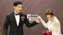 Pernikahan itu dihadiri para sahabatnya, termasuk personel After School lainnya. Jung Ah dan Jung Chang Young menikah di New Hilltop Hotel di Seoul. (Foto: soompi.com)