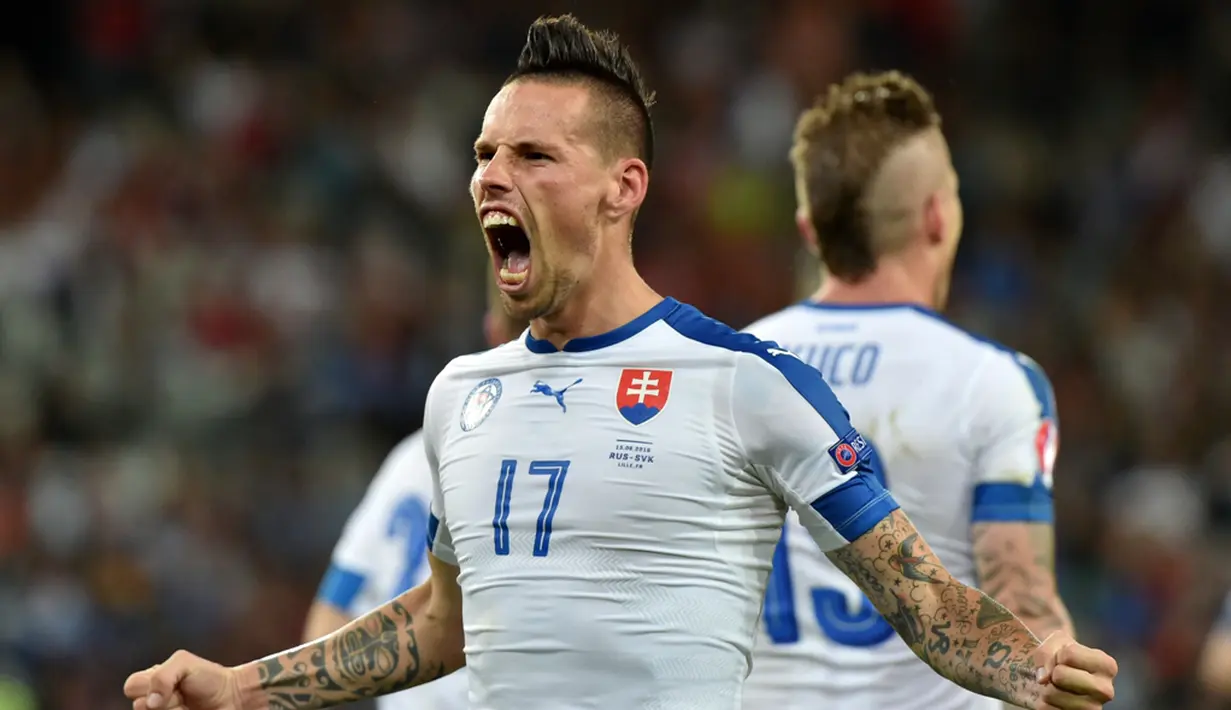 Marek Hamsik berperan besar dalam kemenangan Slovakia atas Rusia 2-1, (15/6/2016). Hamsik mencetak satu gol dan memberikan satu assist dalam pertandingan itu. (AFP/Philippe Huguen)