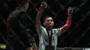 Stefer Rahardian merayakan kemenangan atas Himanau Kaushik pada ajang One Championship 2018 di Jakarta Convention Center, Sabtu (12/5/2018). Stefer Rahardian mudah pada menit kedua ronde pertama. (Bola.com/Nick Hanoatubun)
