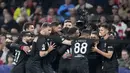 Benfica melaju ke babak perempat final usai menaklukkan Ajax Amsterdam pada laga leg ke dua babak 16 besar Liga Champions. Kemenangan tersebut membuat tim asal Portugal itu menang dengan agregat 3-2. (AP/Peter Dejong)