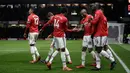 Pemain Manchester United, Jesse Lingard dan Ashley Young merayakan gol ke gawang Watford pada laga pekan ke-14 Premier League 2017-2018 di Vicarage Arena, Selasa (28/11). Dua gol Ashley Young bantu The Red Devils menang 4-2. (AP/Matt Dunham)