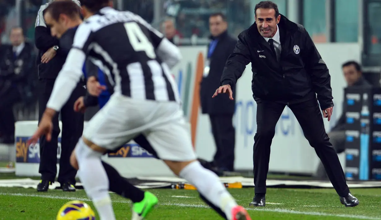 Angelo Alessio kemudian diajak Antonio Conte untuk membantunya di Sienna pada 2010. Sejak saat itu, Conte selalu membawanya ke tempat di mana dia berkarier semisal Juventus, Timnas Italia, hingga Chelsea. (Foto: AFP/Guiseppe Cacace)