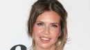 Dasha Zhukova tersenyum saat menghadiri The Museum Of Contemporary Art, Los Angeles pada tanggal 29 Maret 2014. Dasha Zhukova merupakan istri ketiga Abramovich. (Imeh Akpanudosen / Getty Images / AFP)