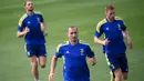 Pemain Juventus Giorgio Chiellini (tengah) menghadiri sesi latihan bersama rekan satu timnya di The Juventus Training Center, Turin, Italia, 13 September 2021. Juventus akan menghadapi Malmo pada pertandingan Grup H Liga Champions. (MARCO BERTORELLO/AFP)