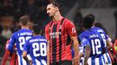 Zlatan Ibrahimovic yang masuk di babak kedua berhasil menggetarkan jala gawang Porto pada menit ke-83, dengan memanfaatkan umpan dari Theo Hernandez. Sayang gol tersebut dianulir lantaran Hernandez terjebak dalam posisi offside. (AFP/Marco Bertorello)