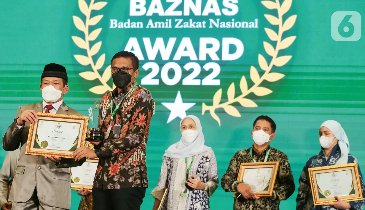BAZNAS merupakan mitra lembaga donasi LinkAja sejak tahun 2019 dan 2021, Penghimpunan donasi Layanan Syariah LinkAja melalui BAZNAS mengalami peningkatan transaksi sebesar lebih dari 440%, pengguna aktif lebih dari 310% dan nilai donasi sebesar lebih dari 330%. (Liputan6.com/Fery Pradolo)