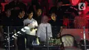 Selama pertandingan berjalan, Jokowi dan Iriana berkali-kali bertepuk tangan saat Ginting menambah skor. (Liputan6.com/Herman Zakharia)