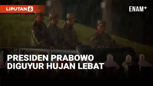 VIDEO: Di Tengah Hujan Lebat, Presiden Prabowo Pimpin Upacara Parade Senja