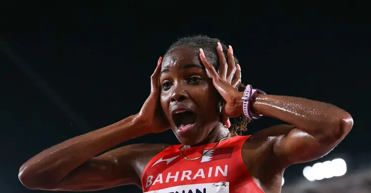 Atlet Bahrain Winfred Yavi bereaksi setelah memenangi final 10.000 meter putri pada Asian Games 2026 di Nagoya, Jepang, Kamis (24/9/2026). (MOHD RASFAN / AFP)
