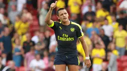 Pemain Arsenal, Alexis Sanchez mencetak satu gol saat Arsenal dijamu Watford pada lanjutan liga Inggris pekan ke-3 di Vicarage Road Stadium (27/8/2016). Arsenal menang 3-0.(AFP/Sean Dempsey)