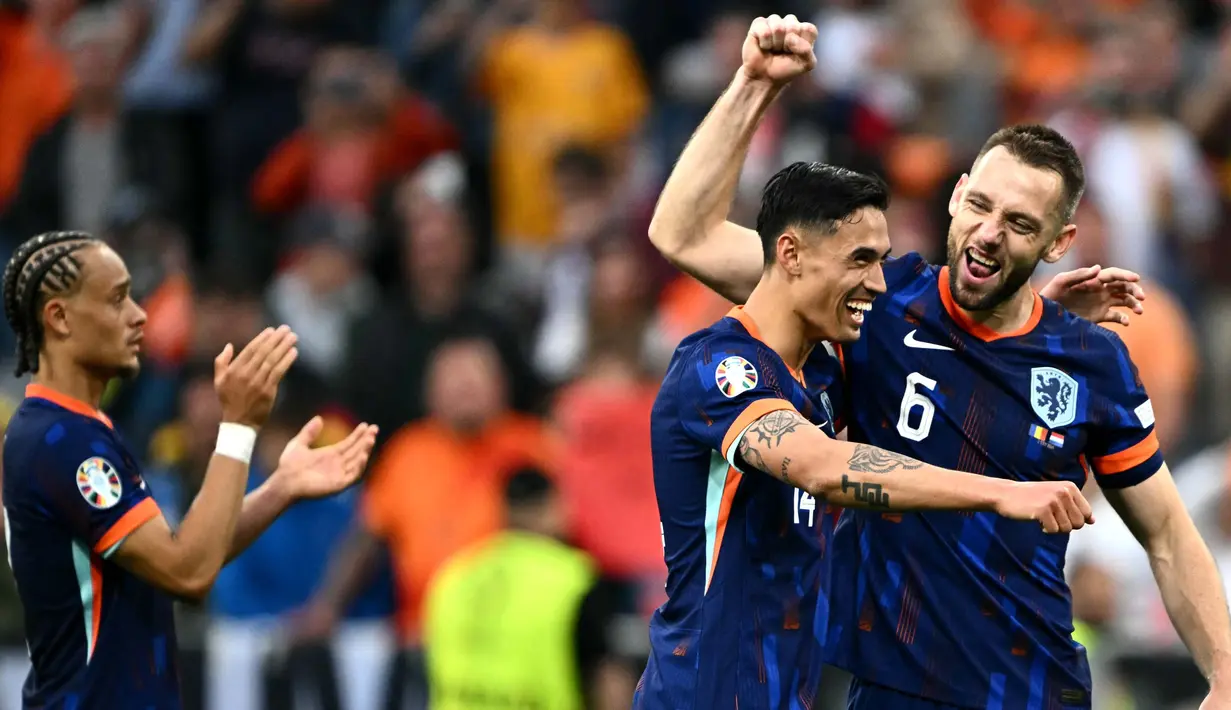 Hingga peluit akhir pertandingan dibunyikan, skor 3-0 untuk kemenangan Belanda tidak berubah. (Fabrice COFFRINI/AFP)