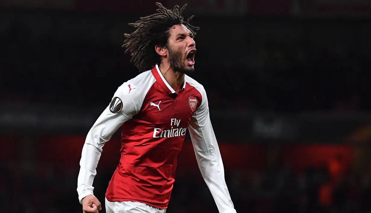 4. Mohamed Elneny. Gelandang yang didatangkan Arsenal dari klub Swiss FC Basel pada awal musim 2015/2016 ini telah mencetak 3 gol dalam 113 penampilannya bersama The Gunners hingga saat ini. Sempat dipinjamkan selama satu musim ke klub Turki Besiktas pada musim lalu. (AFP/Ben Stansall)