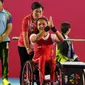 Atlet para angkat berat, Ni Nengah Widiasih, saat beraksi pada Asian Para Games di Balai Sudirman, Jakarta, Minggu (7/10/2018). Ni Nengah berhasil mempersembahkan medali perak dengan total angkatan 97 kg. (Bola.com/M Iqbal Ichsan)