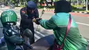 Aksi ini mengangkat tema Tebar Sejuta Mawar Kebaikan. (merdeka.com/Arie Basuki)