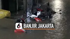 Sejumlah titik di Ibu Kota Jakarta terendam banjir Sabtui (20/2) dini hari, Banjir hampir tenggelamkan kendaraan warga di daerah Petotogan Jakarta Selatan.